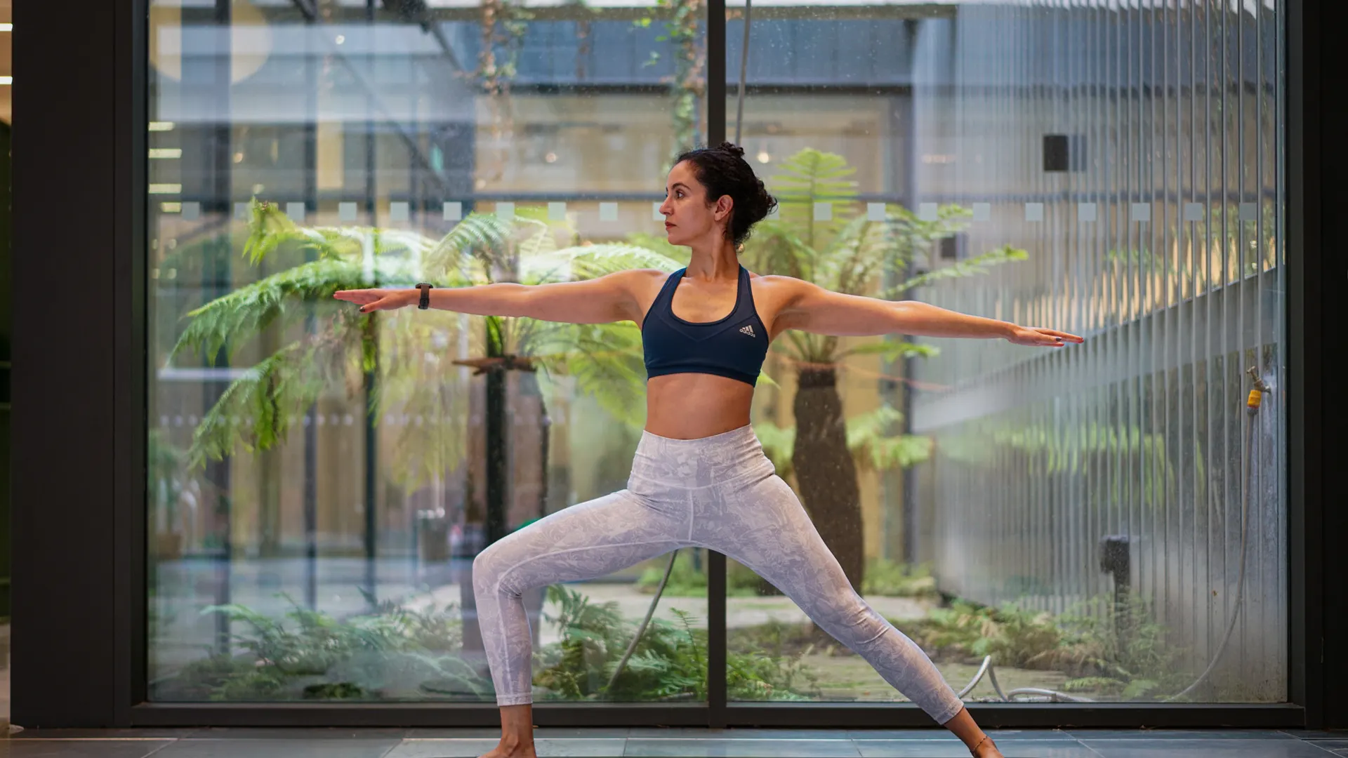 Yoga practitioner in a serene studio space